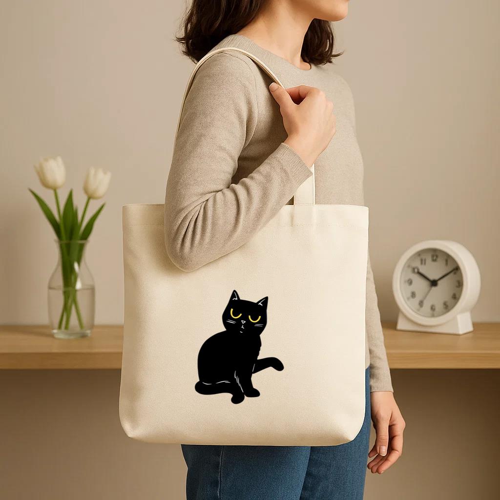 Black Cat With Yellow Eyes Sitting Canvas Tote Bag image 2