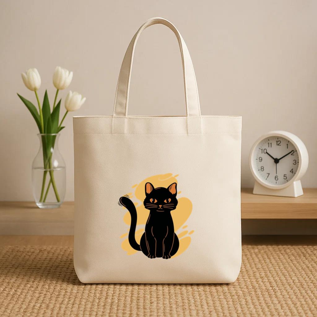 Black Cat Sitting Yellow Background Canvas Tote Bag image 1